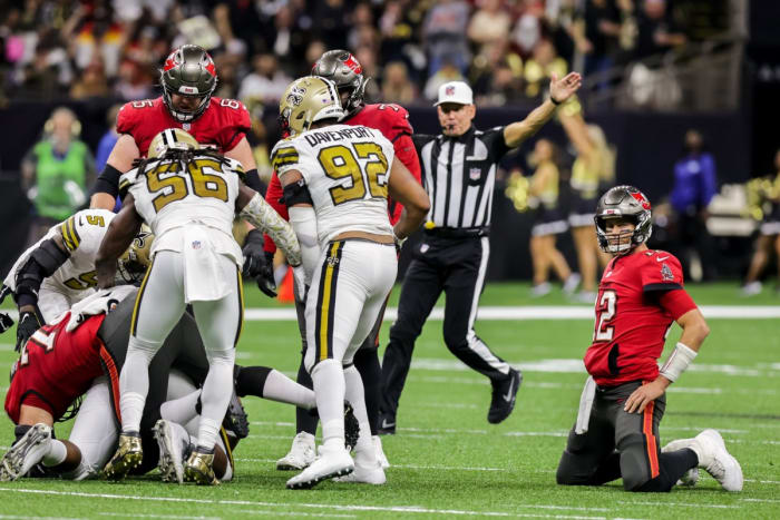 Tampa Bay Buccaneers quarterback Tom Brady (12) reacts to loosing a fumble against New Orleans. Mandatory Credit: Stephen Lew-USA TODAY Sports